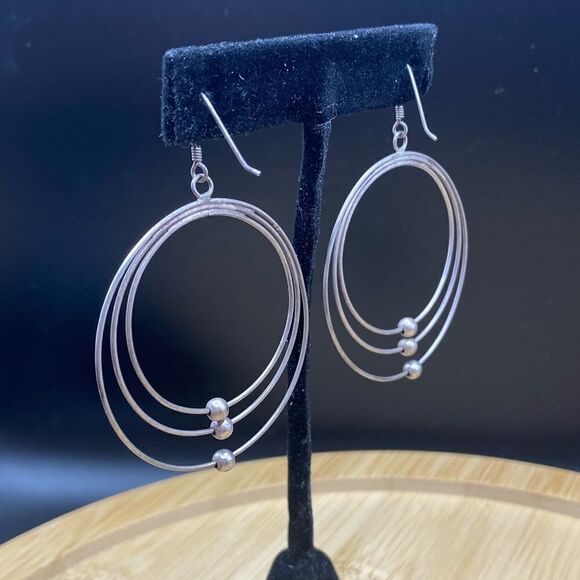 925 silver triple hoop earrings with fishhooks and are 1 3/4” long - Picture 4 of 6